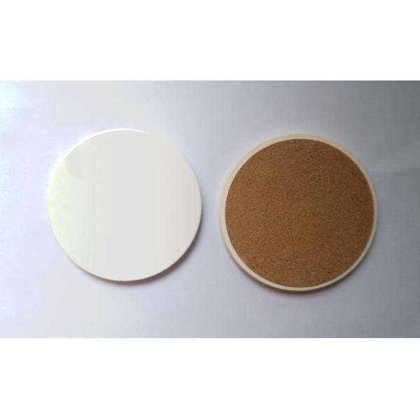 Round ceramic coaster with cork backing and UV printed/ silkscreen logo